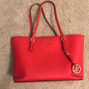 Red/orange Michael Kors purse